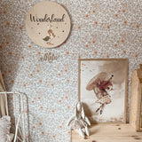 Neutral tone flower wallpaper, matches beautifully with natural wood decor in a children's room
