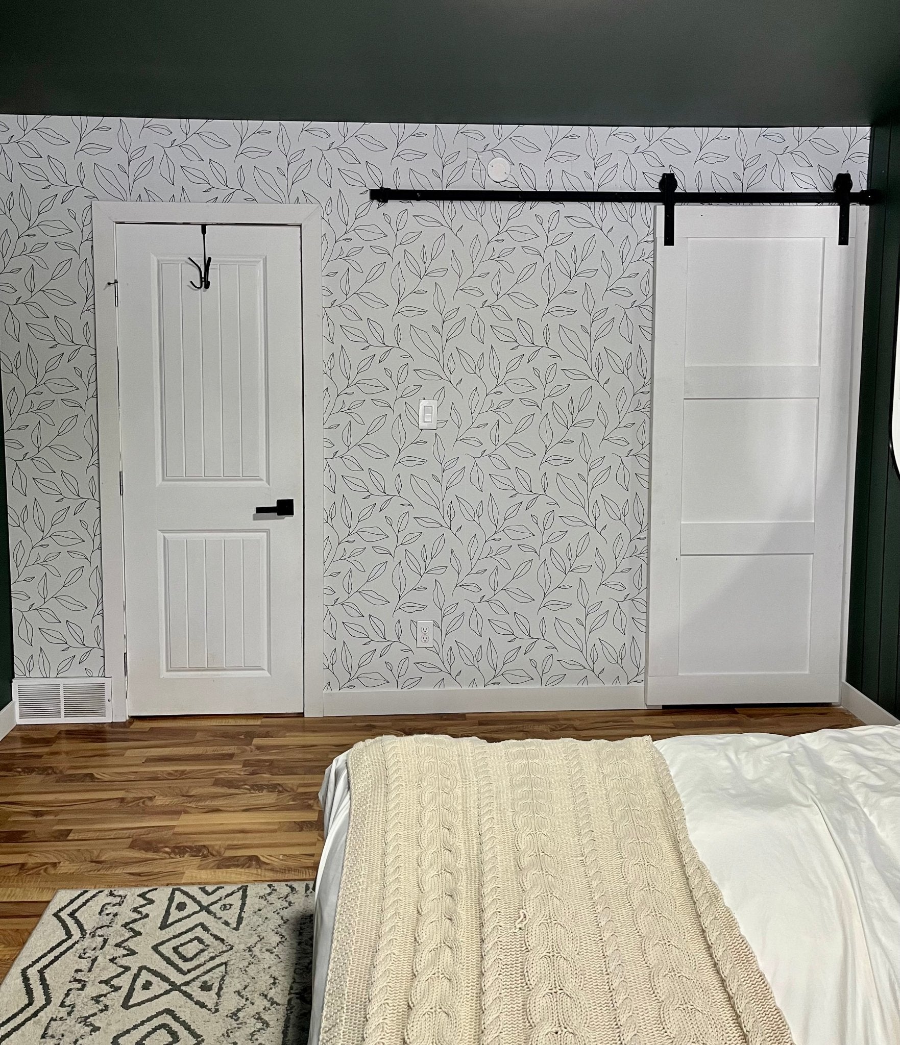 Boho inspired peel and stick wallpaper for master bedroom