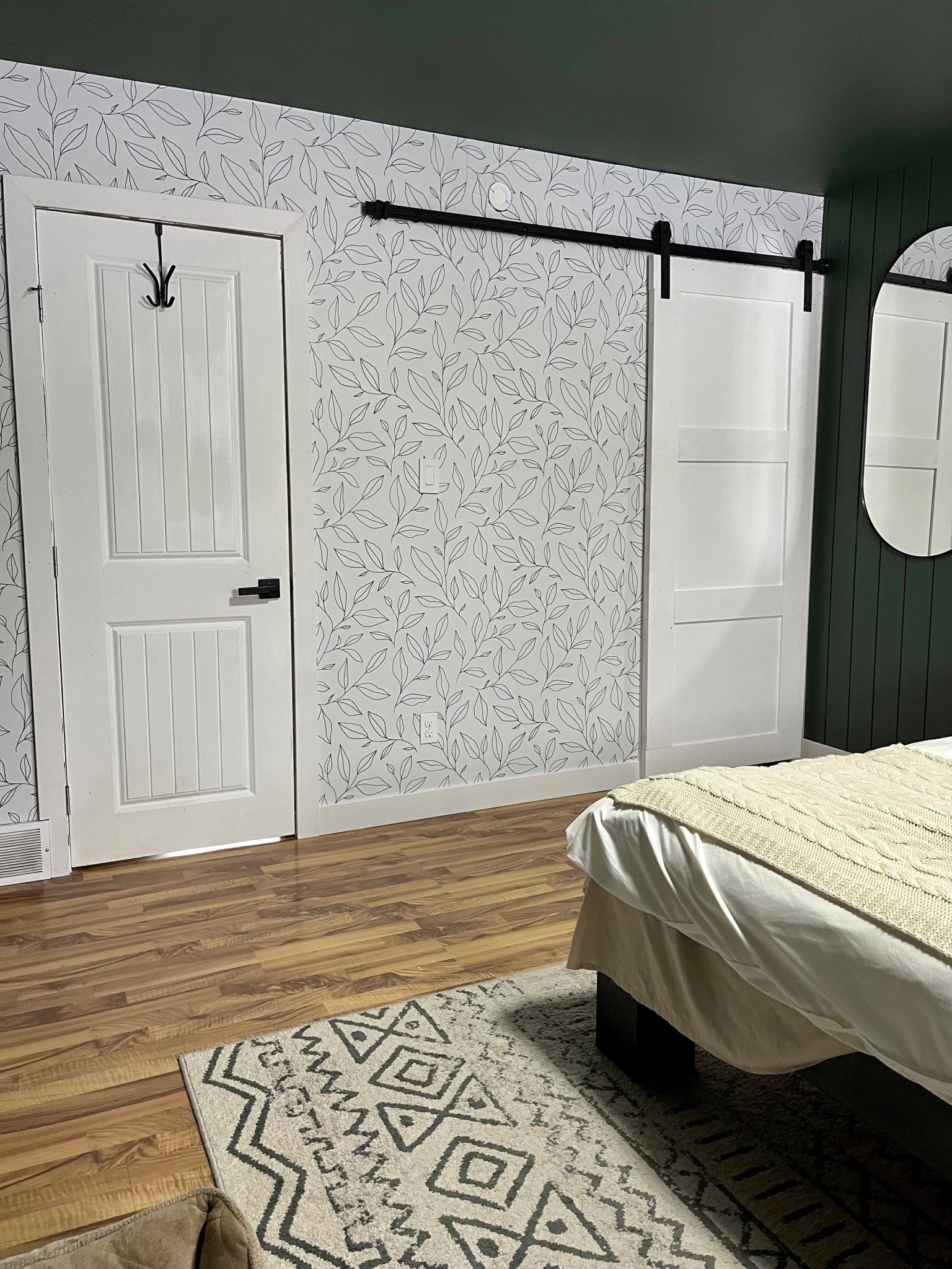 Beautiful master bedroom with earthy tones and minimal floral removable wallpaper