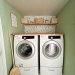 Makeover in Laundry Room using peel and stick oranges wallpaper