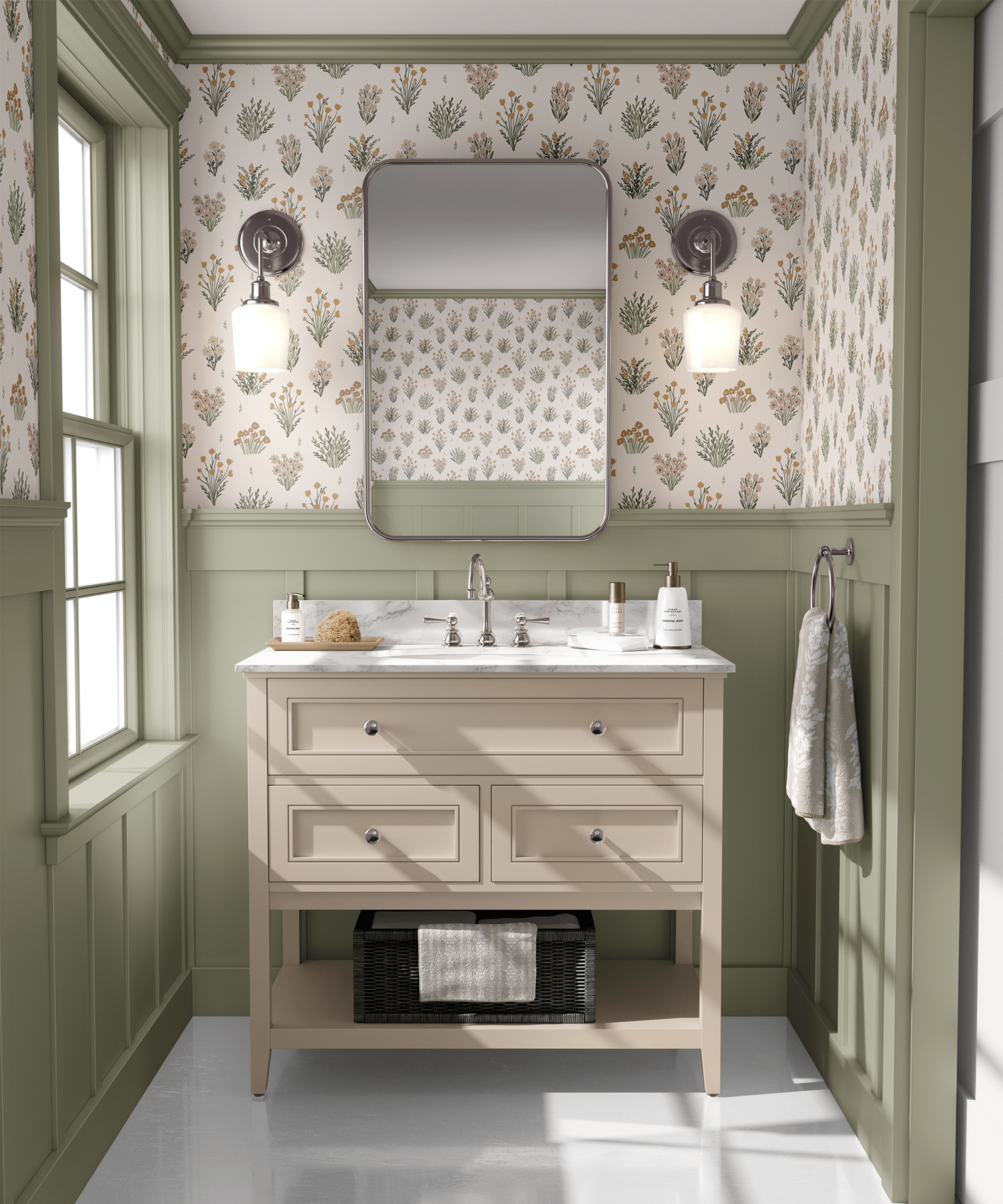 A bathroom with pastel floral wallpaper, sage green wainscoting, and a beige vanity set against a marble floor