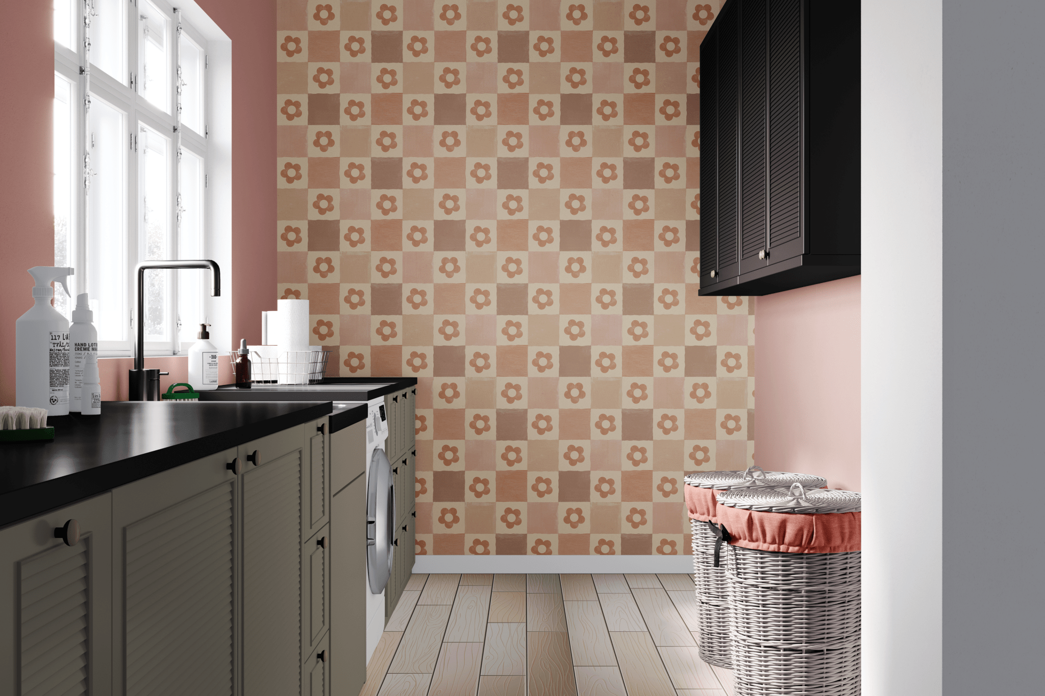 Modern laundry room with dusty rose picnic-pattern peel and stick wallpaper, contrasting black cabinetry, and woven laundry baskets