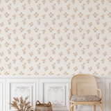 Sage sprig peel and stick wallpaper in a fresh, neutral tone enhances a traditional entryway with wainscoting.