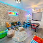 Kids arcade room with peel and stick stone brick wallpaper