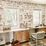 Natural coloured office featuring toile de jouy wallpaper