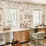 Natural coloured office featuring toile de jouy wallpaper