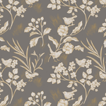 A close-up of peel and stick wallpaper with a whimsical floral and bird pattern on a dark background