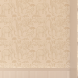 African Safari style wallpaper featuring wild animals in beige and white in a child's room.