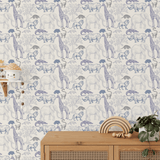 Safari Animal wallpaper featuring wild animals in blue and white in a child's room.