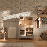 Blue safari wildlife animal wallpaper in a child's modern aesthetically pleasing room