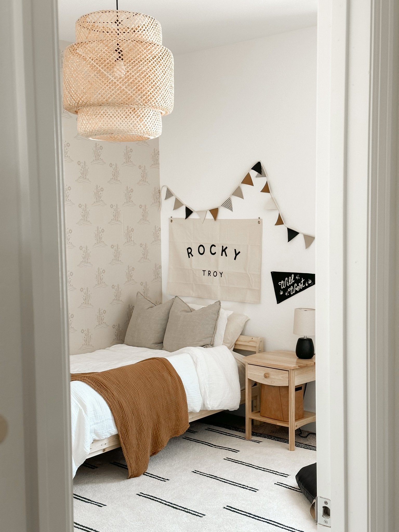 Little Boys Aesthetic Bohemian Style Bedroom with natural accents and peel and stick wallpaper