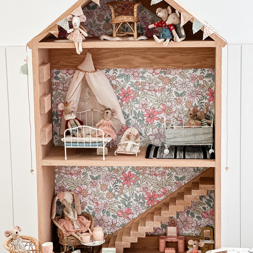 Transforming a mouse dolls house with wallpaper