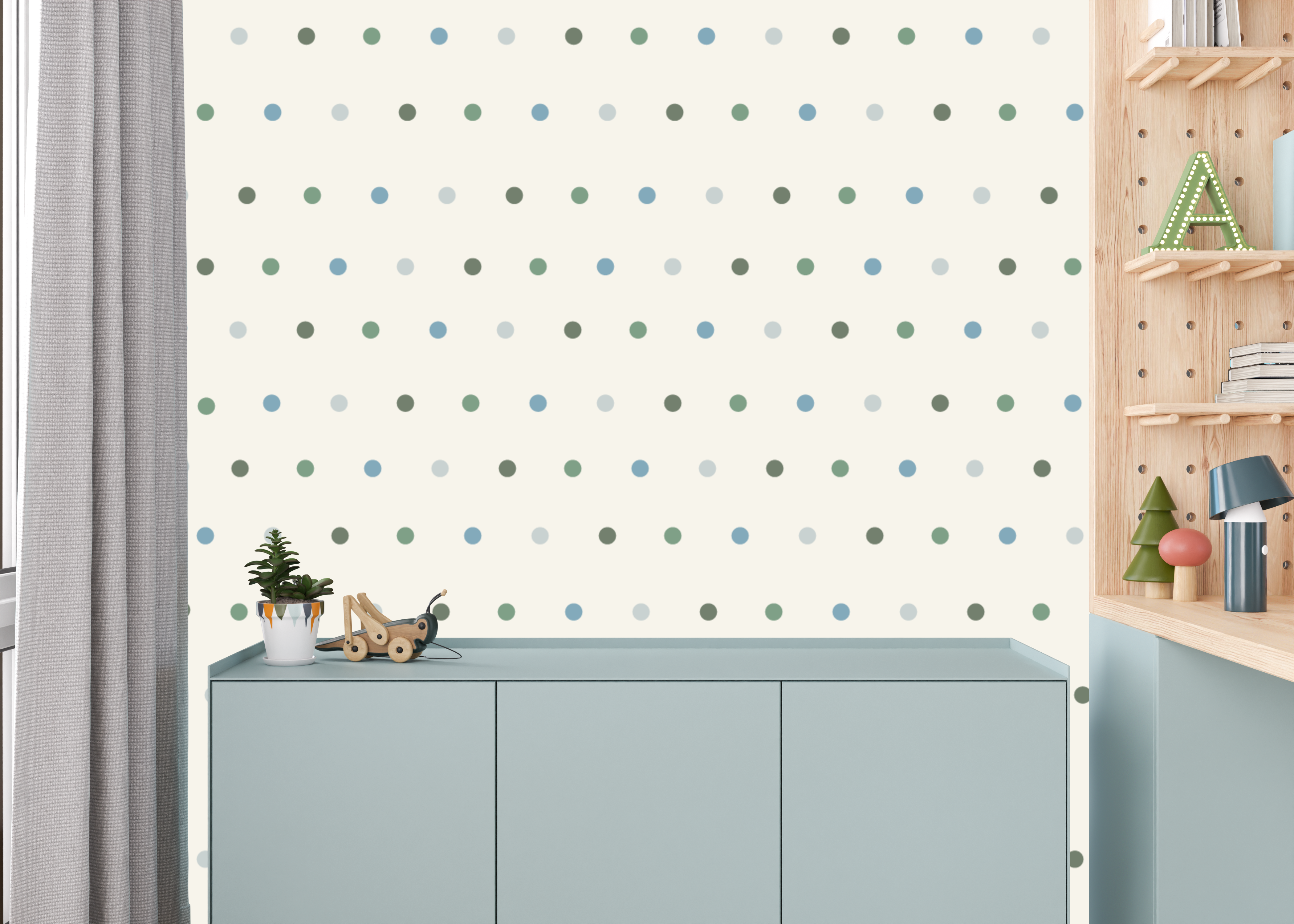 Color customizable 1 inch peel and stick wall dots in sage green, blue and gray decorating a modern kids bedroom accent wall.