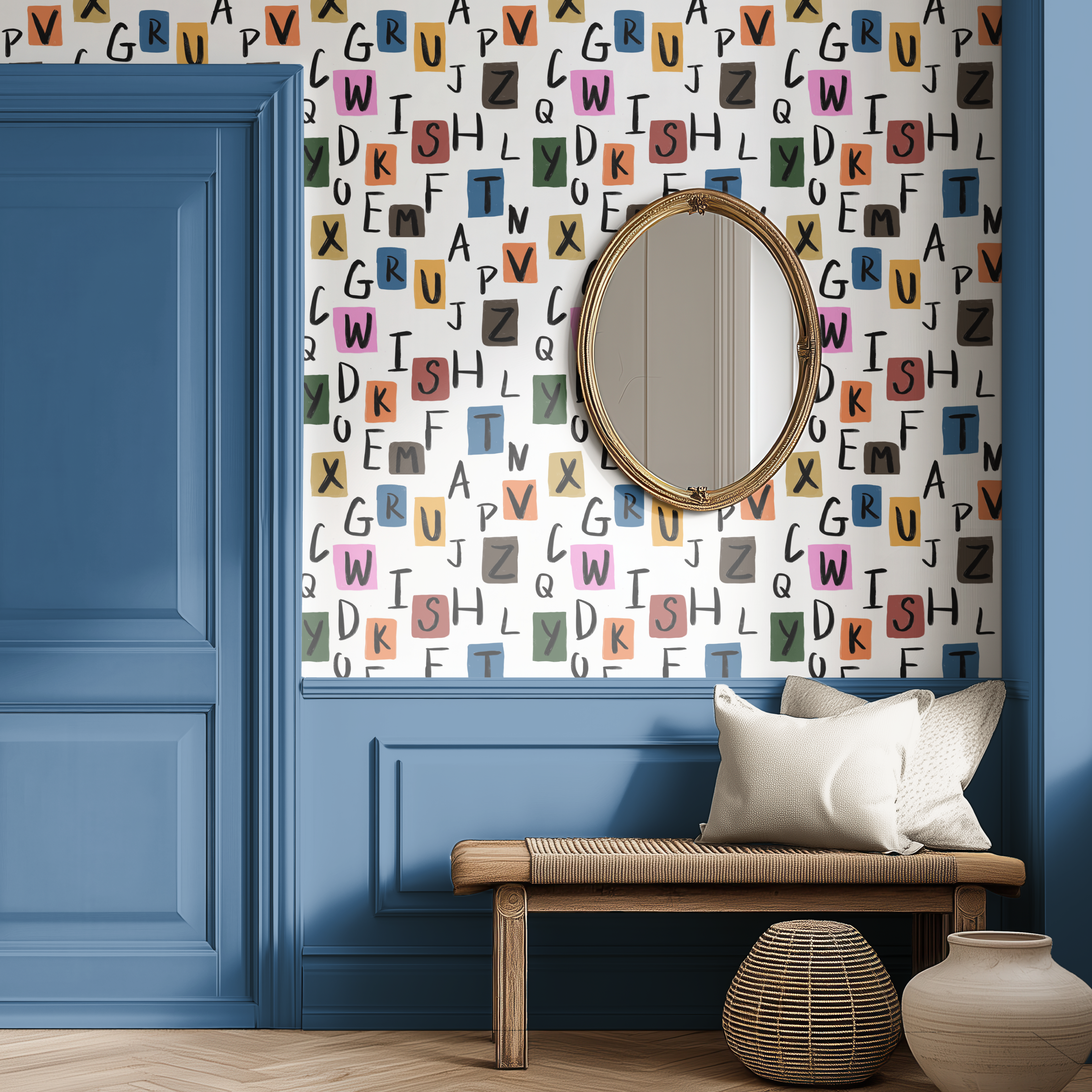 Room interior with blue walls, wooden bench, and decorative mirror against a colorful alphabet-patterned wall.