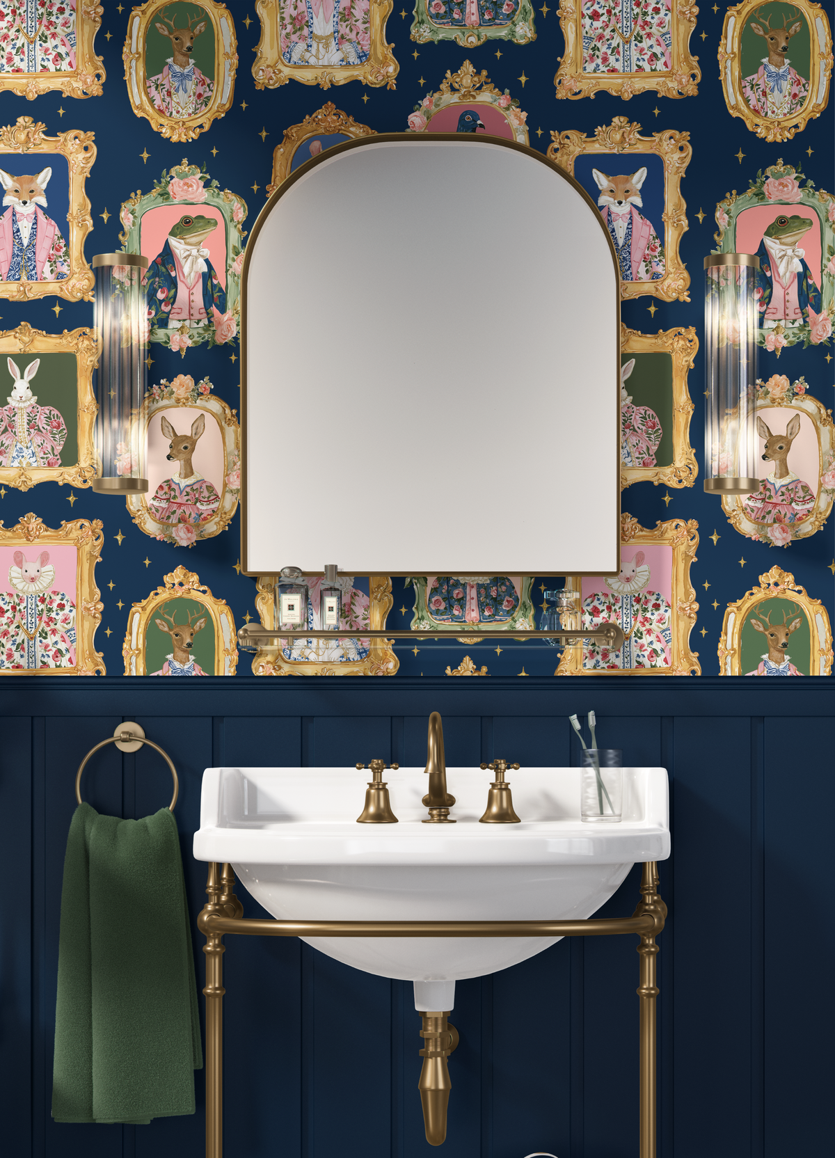 Animal Portrait Wallpaper in a navy bathroom with ornate gold framed woodland animals, dark blue wainscoting and brass fixtures
