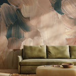 Modern abstract wall mural behind olive green sofa and rustic coffee table decor