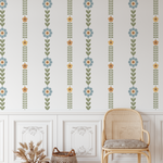 Floral stripe wall decals arranged in even vertical rows behind a wooden toy market stand in a kids playroom