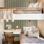 Boys' bedroom with green striped wallpaper, bunk beds, and a small desk workspace