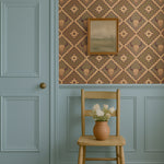 Brown western wallpaper with buffalo skull design styled in a modern laundry room