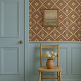 Brown western wallpaper with buffalo skull design styled in a modern laundry room