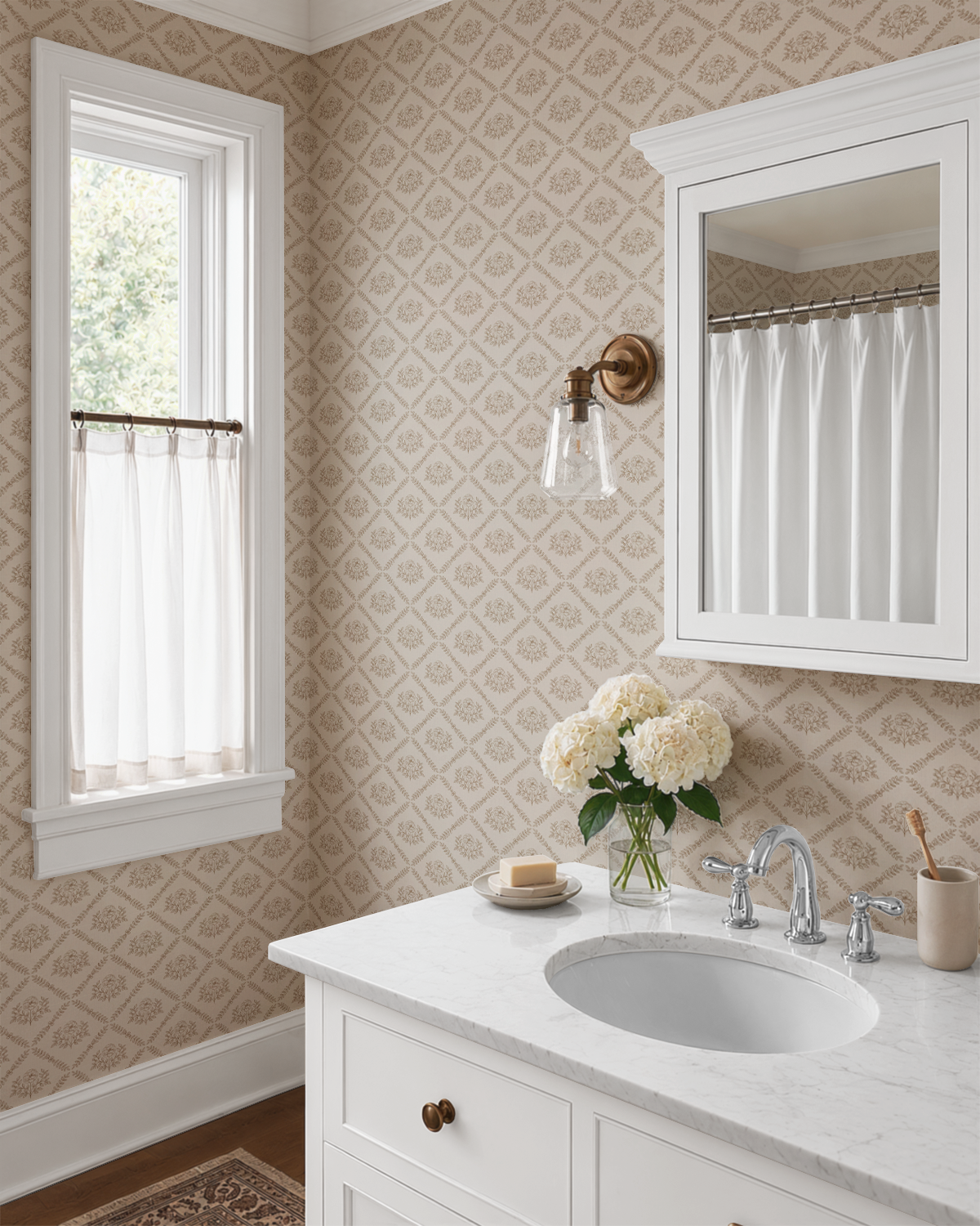 Brown Floral Medallion Wallpaper in a bright bathroom with white vanity, marble countertop, brass lighting, and timeless vintage decor.