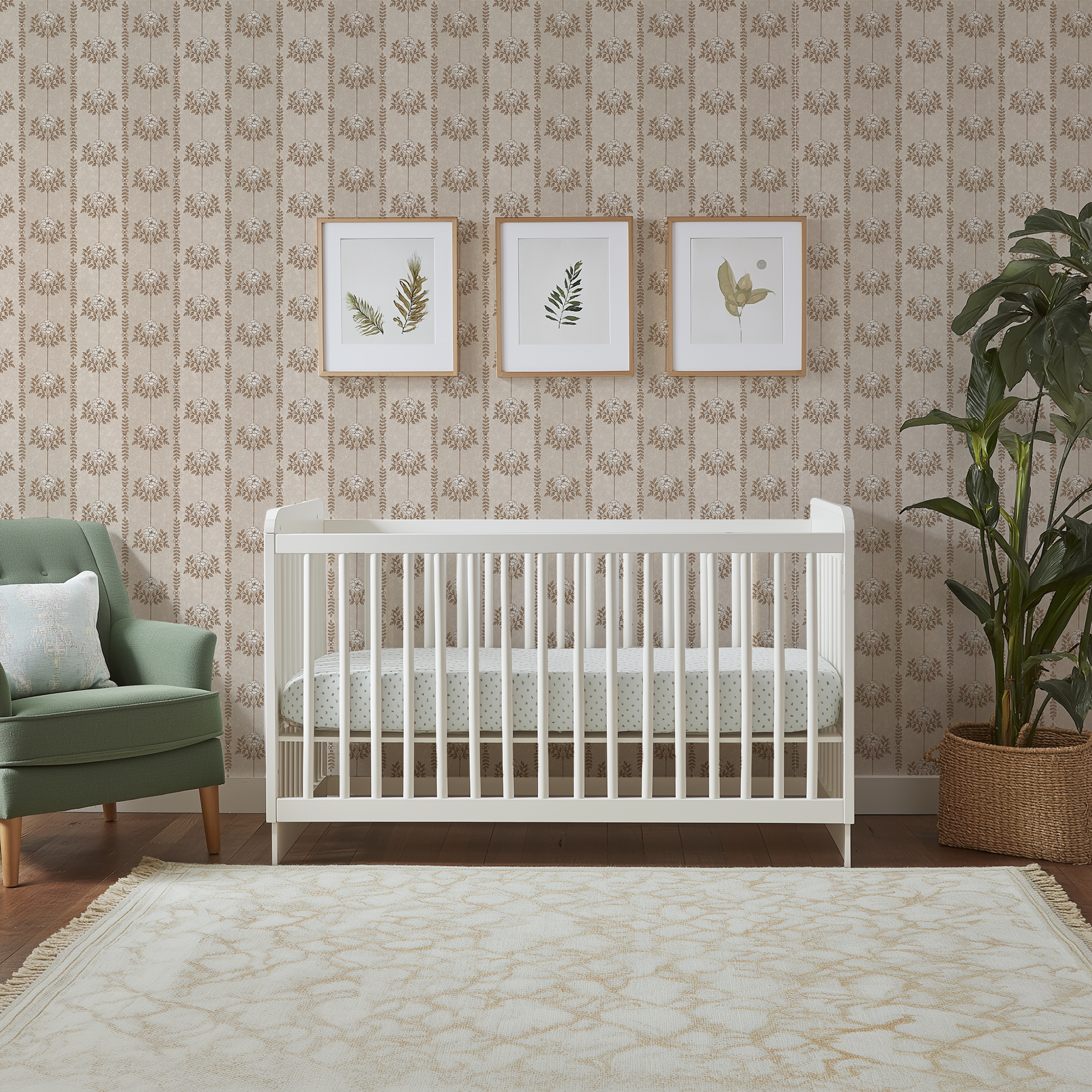 Brown Hanging Floral Wallpaper in a vintage nursery with white crib, botanical artwork, and soft neutral floral walls.