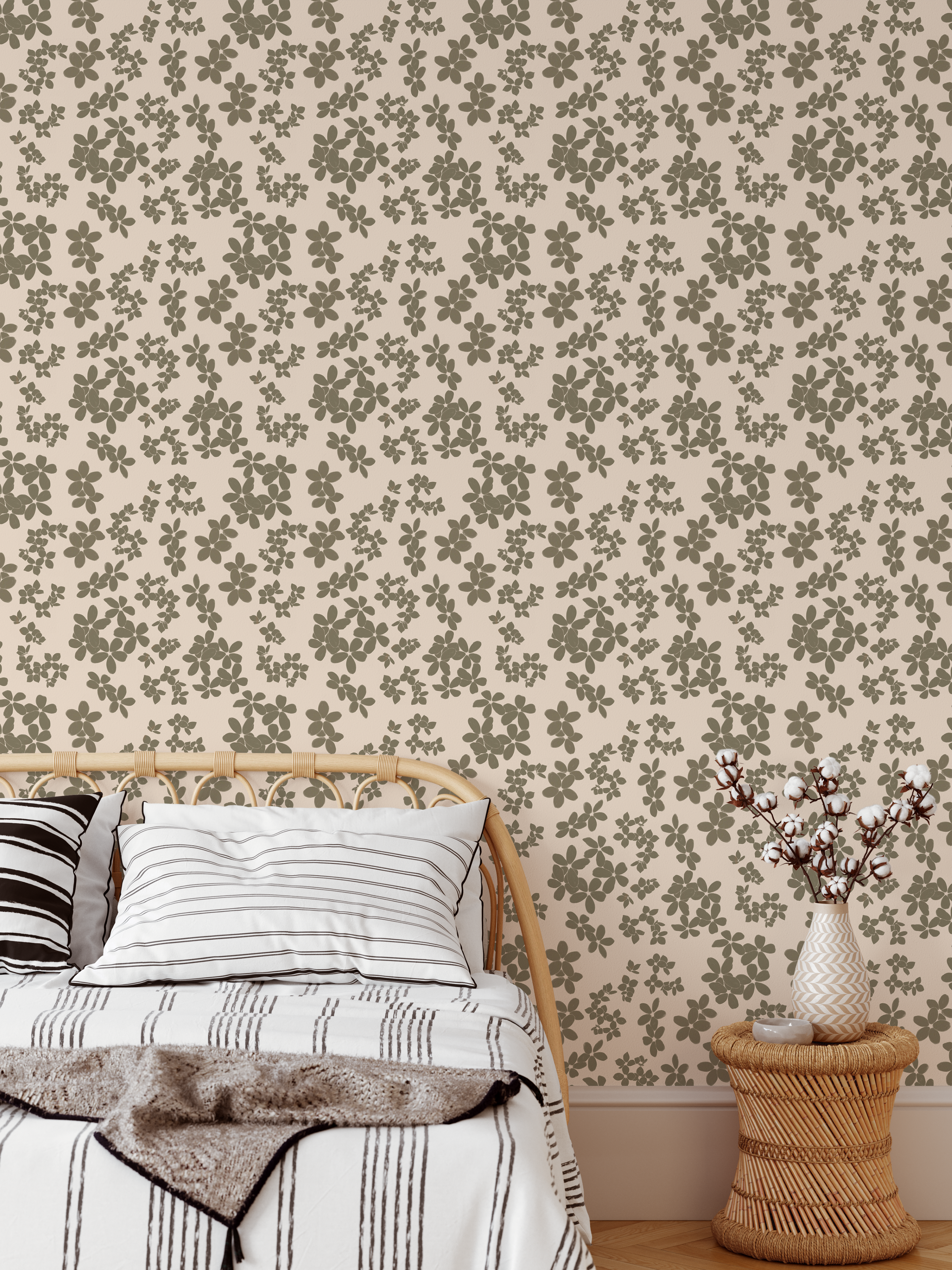 Brush stroke floral wallpaper in neutral beige and olive tones styled in a boho bedroom with rattan furniture