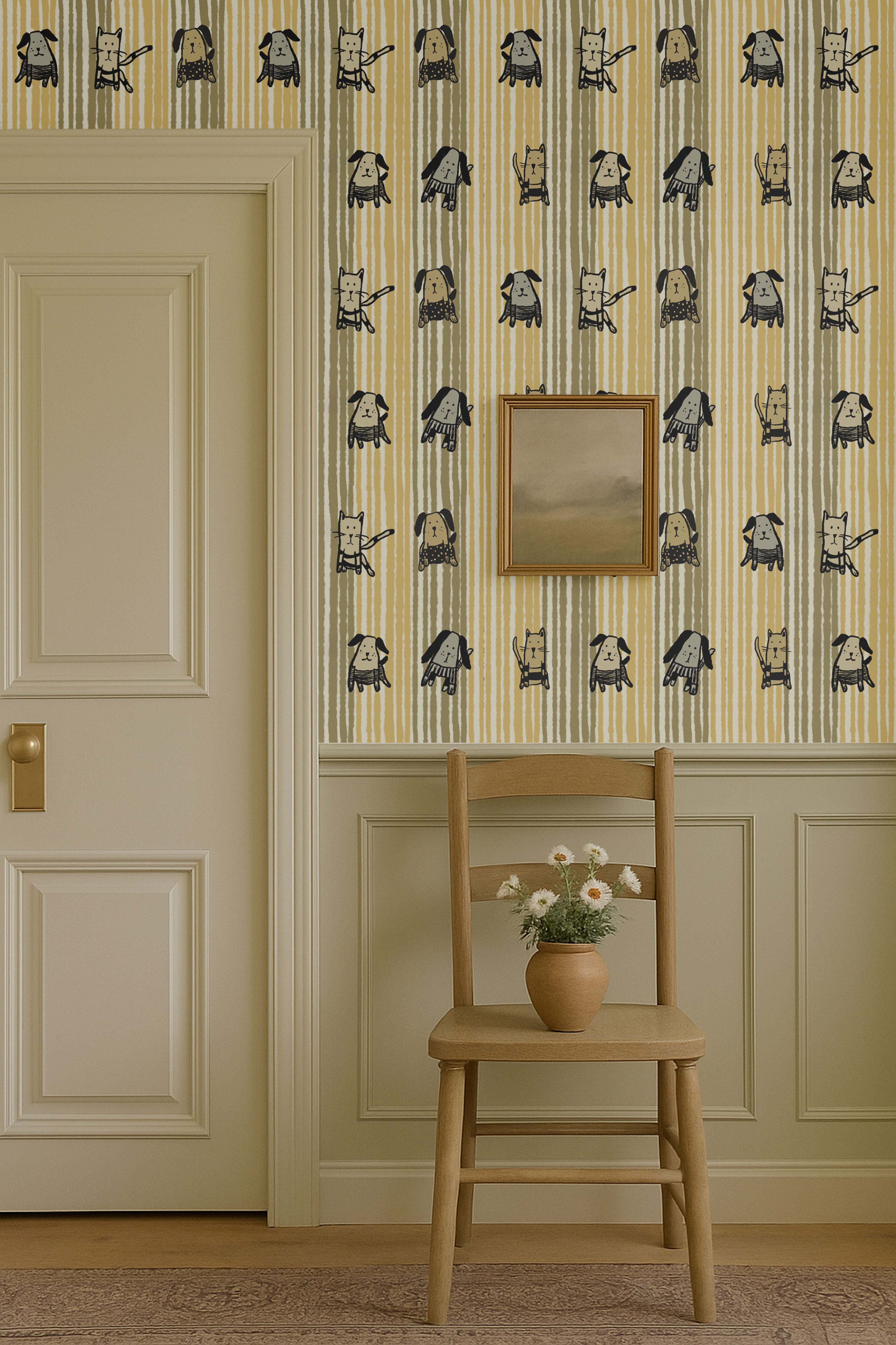 Whimsical cats and dogs wallpaper on striped background in beige and mustard tones, styled in a cozy room with chair and flowers.