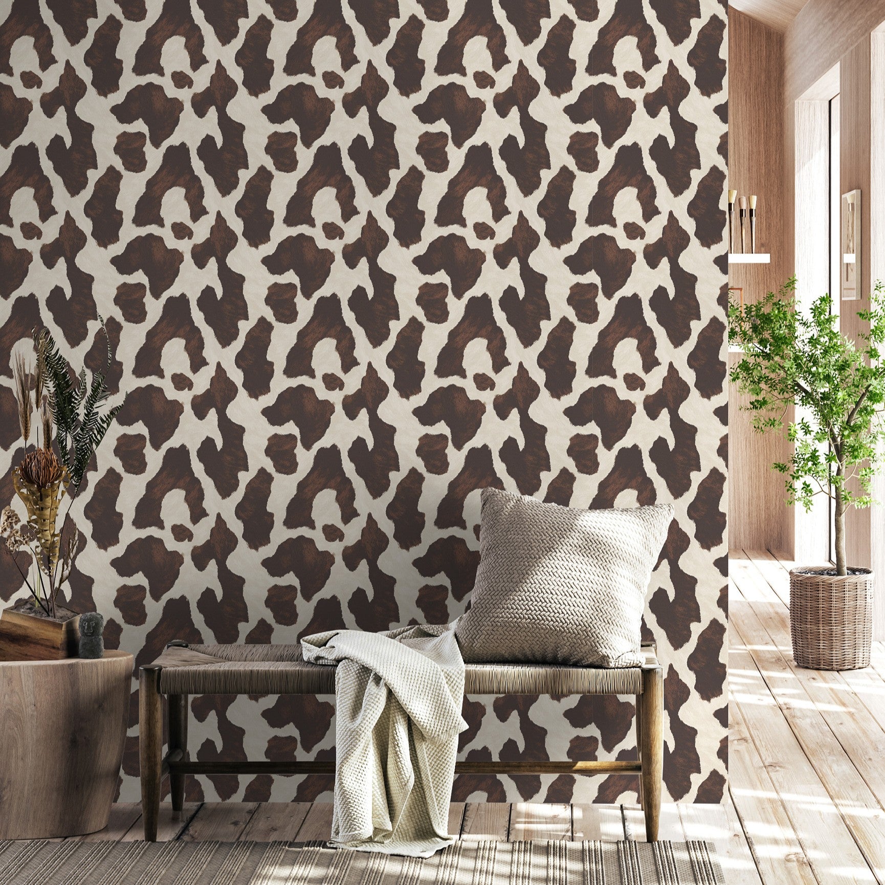 Brown cowhide print wallpaper in modern farmhouse entryway with wooden bench and neutral decor