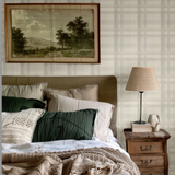 Bedroom with Cream Tartan Wallpaper and rustic wood furnishings.