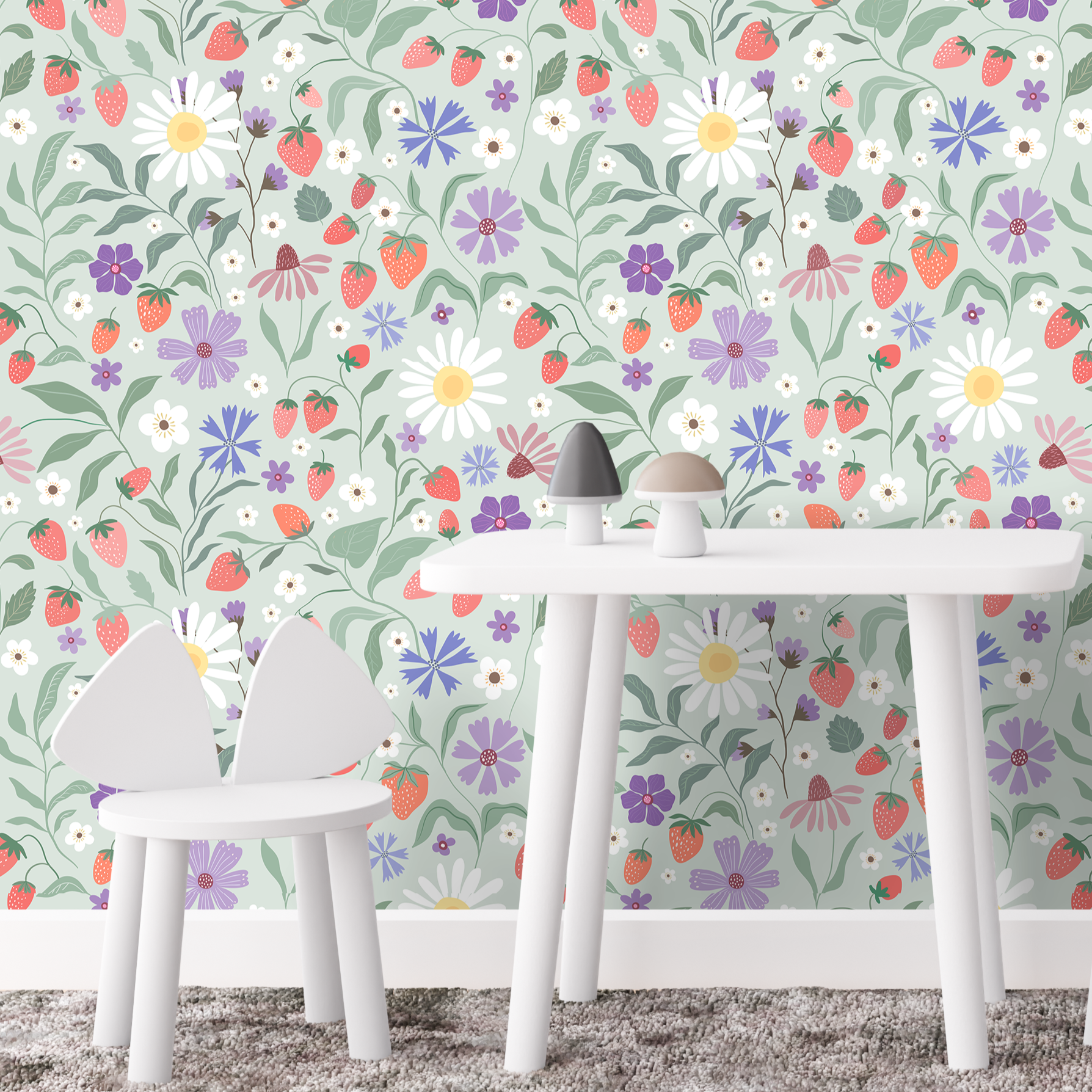 Strawberry floral wallpaper accent wall in kids playroom with whimsical strawberries daisies and wildflower garden pattern