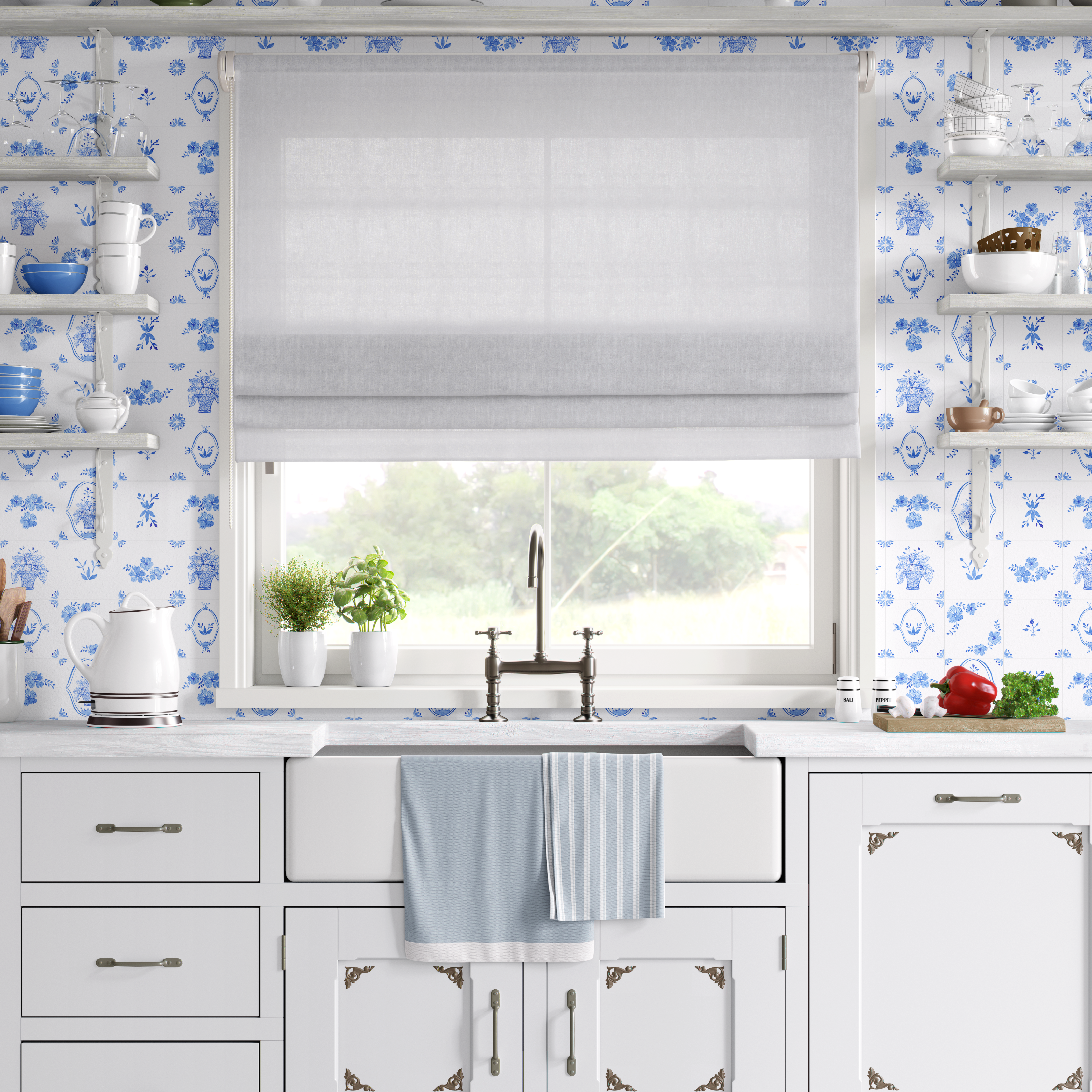White farmhouse kitchen with Delft tile wallpaper in blue and white floral design behind sink and shelves.