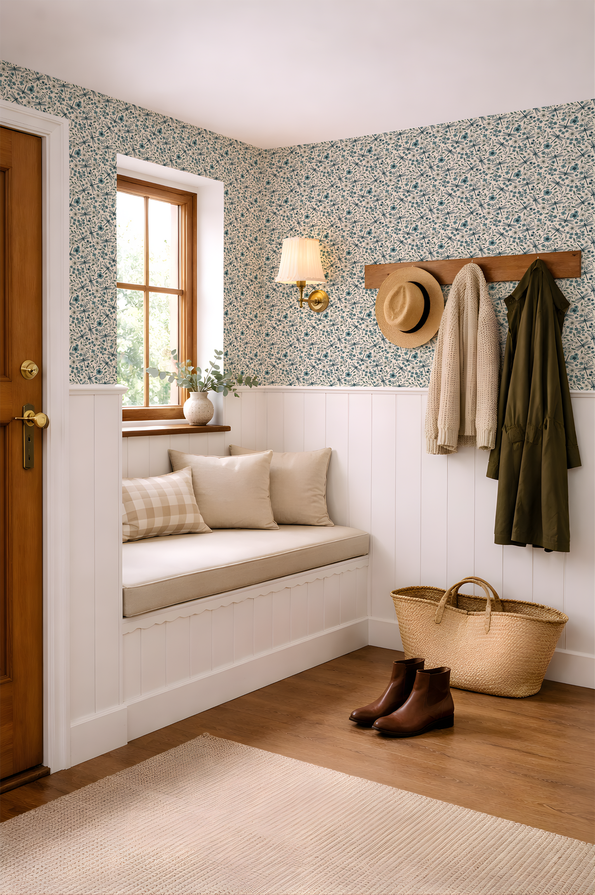 Dragonfly Garden wallpaper in a bright cottage entryway with blue flowers, botanical leaves, white paneling and warm wood accents.