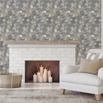 Flagstone tile wallpaper in a cozy living room with white brick fireplace and candles
