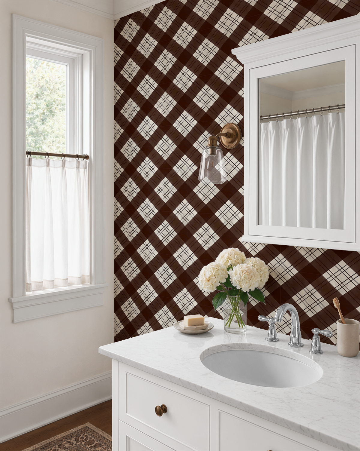 Brown plaid wallpaper installed in a traditional bathroom with white vanity and brass wall sconce