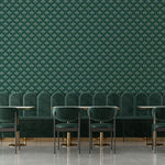 Evergreen blossom wallpaper with small vintage floral pattern on deep green background styled in restaurant seating area