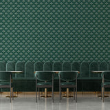 Evergreen blossom wallpaper with small vintage floral pattern on deep green background styled in restaurant seating area