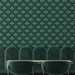 Repeating evergreen blossom floral wallpaper pattern featuring delicate white flowers on rich green backdrop