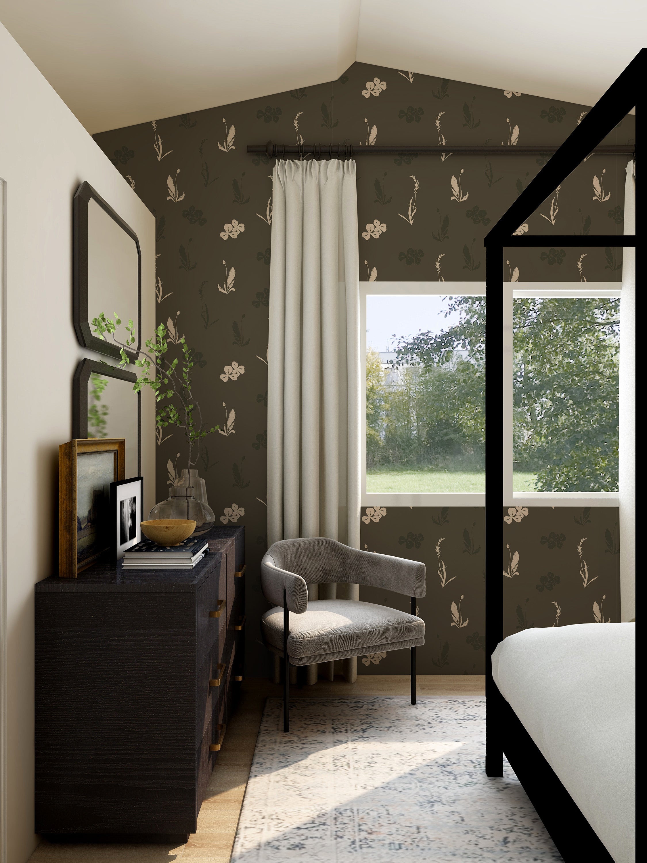 Modern bedroom with dark floral wallpaper, gray armchair, and large window.