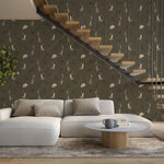Field Study botanical wallpaper installed in a cozy neutral interior with natural wood and linen textures