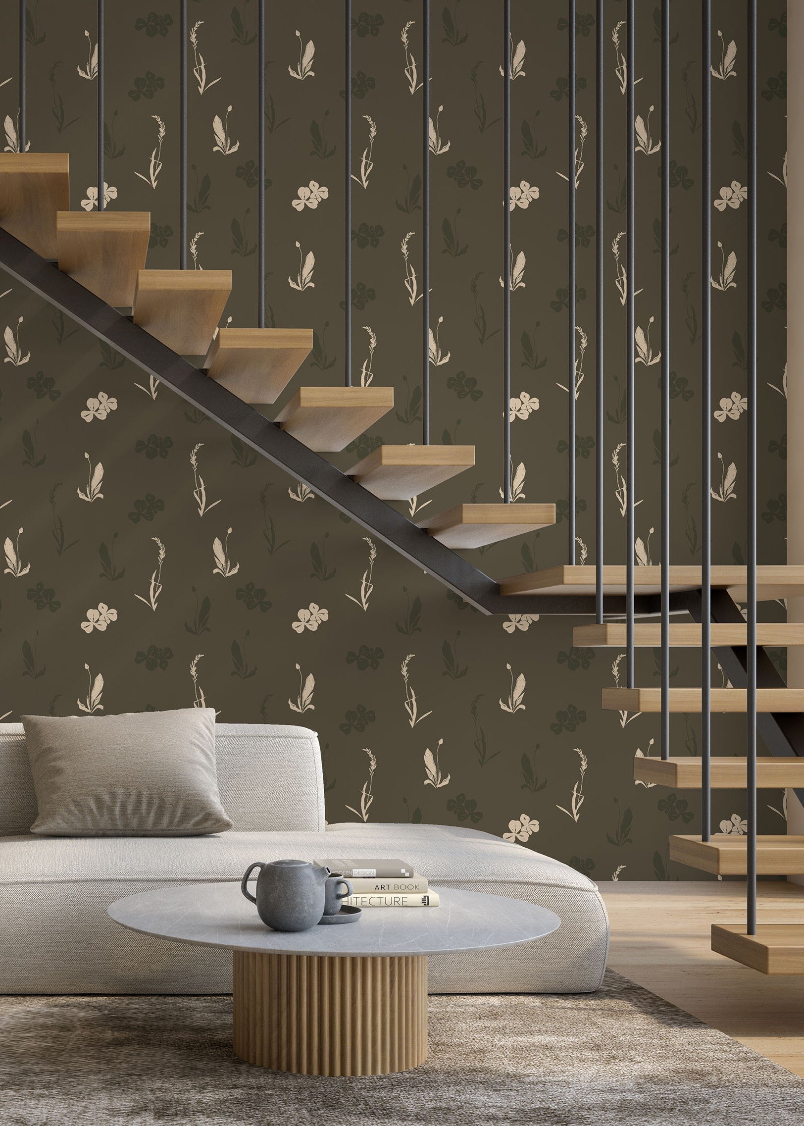 Modern living room with a staircase, floral-patterned wallpaper, and a sofa.
