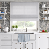 Flagstone tile wallpaper used as backsplash in white farmhouse kitchen with open shelving