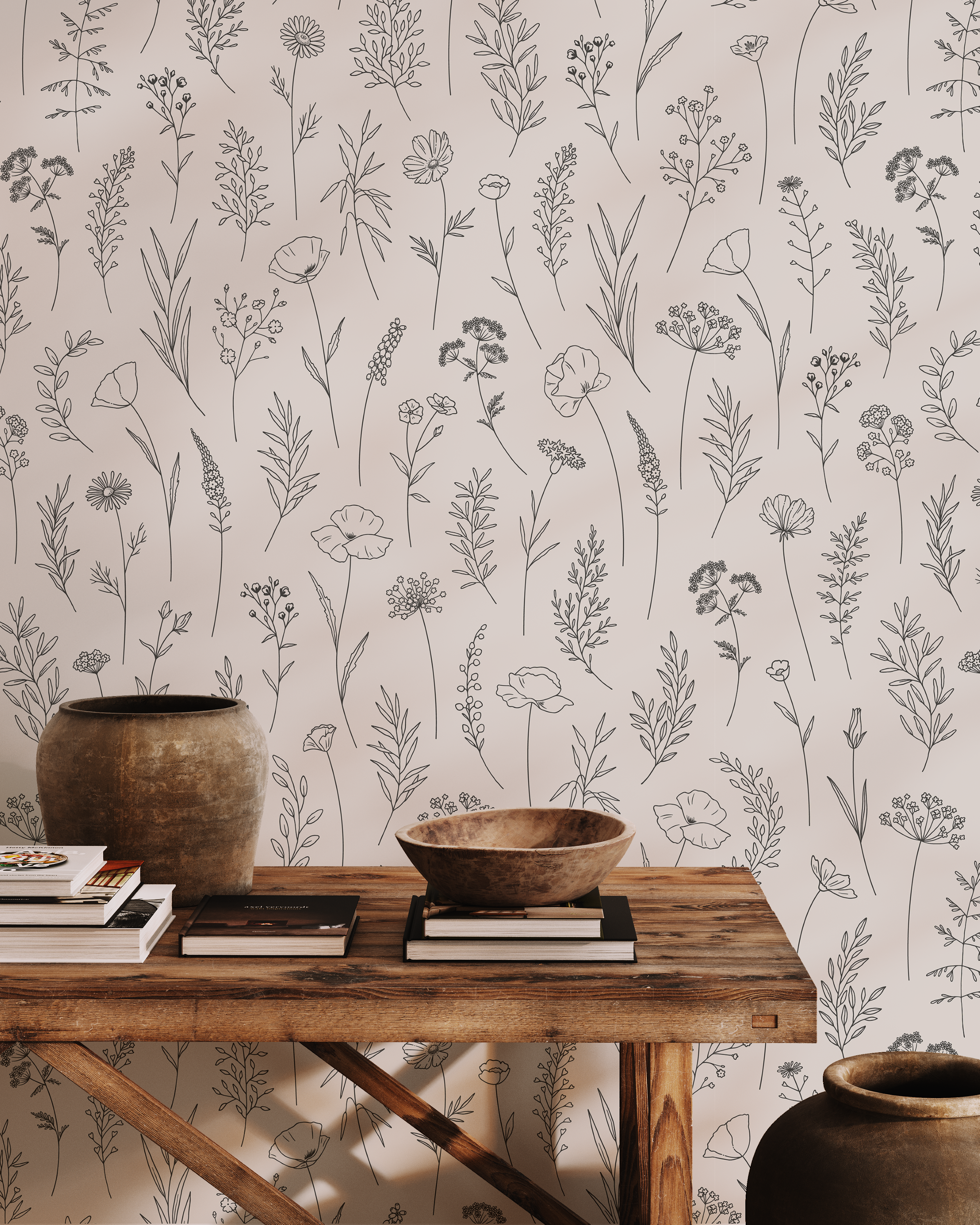 Wallpaper with simple floral pattern, wooden table with decorative items, and vases. French Cottage Decor.