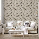 Neutral floral wallpaper styled in a cozy living room with light sofa and natural textures