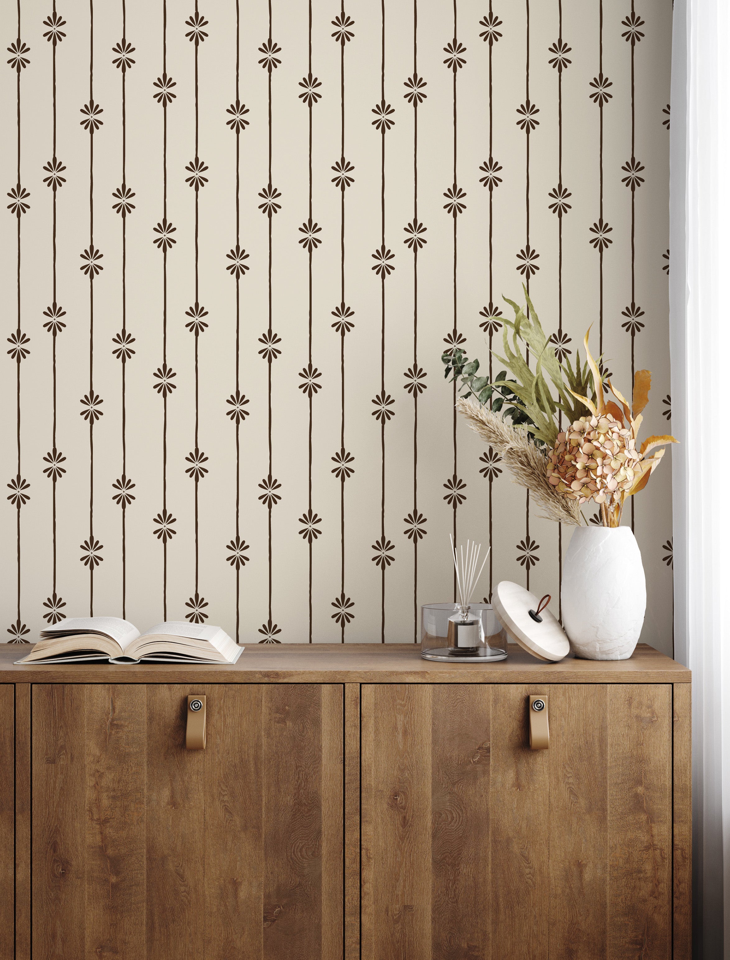 dresser with dried florals in front of Homestead Stripe wallpaper