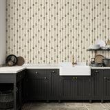 Kitchen with Homestead Stripe wallpaper behind black cabinetry and farmhouse sink