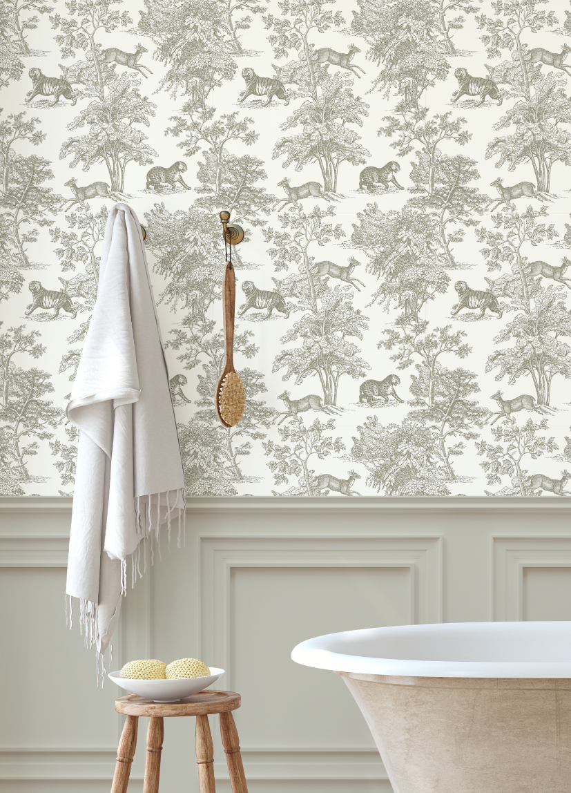 Neutral safari toile wallpaper in bathroom with freestanding tub and soft taupe animal toile design