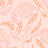 Close-up of hand-drawn flower pattern in pink and orange on blush background