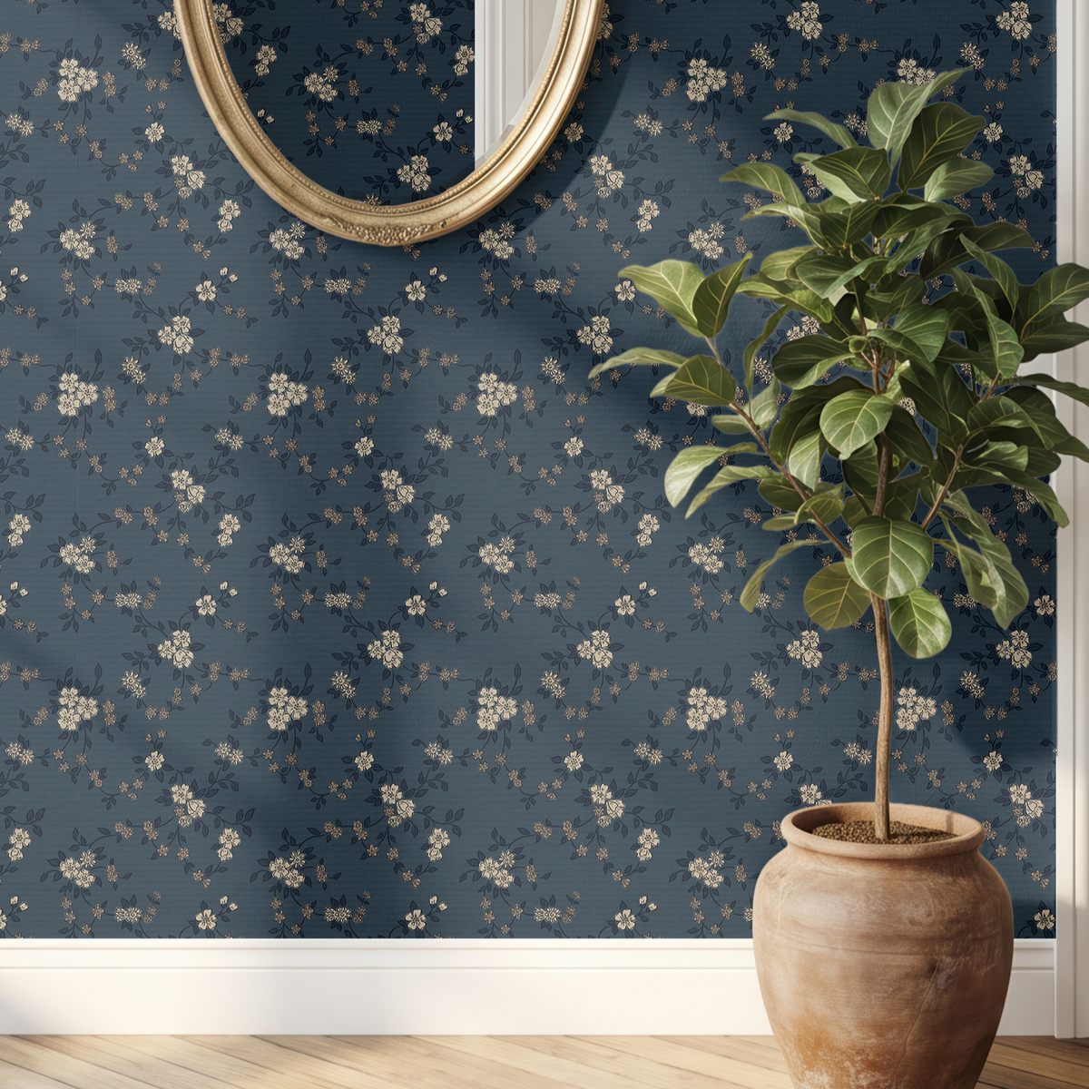 Lauren Florals navy blue floral wallpaper with cream botanical flowers, gold mirror and potted tree