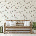 Wide room view with mallard duck wallpaper and rustic bench between two doors